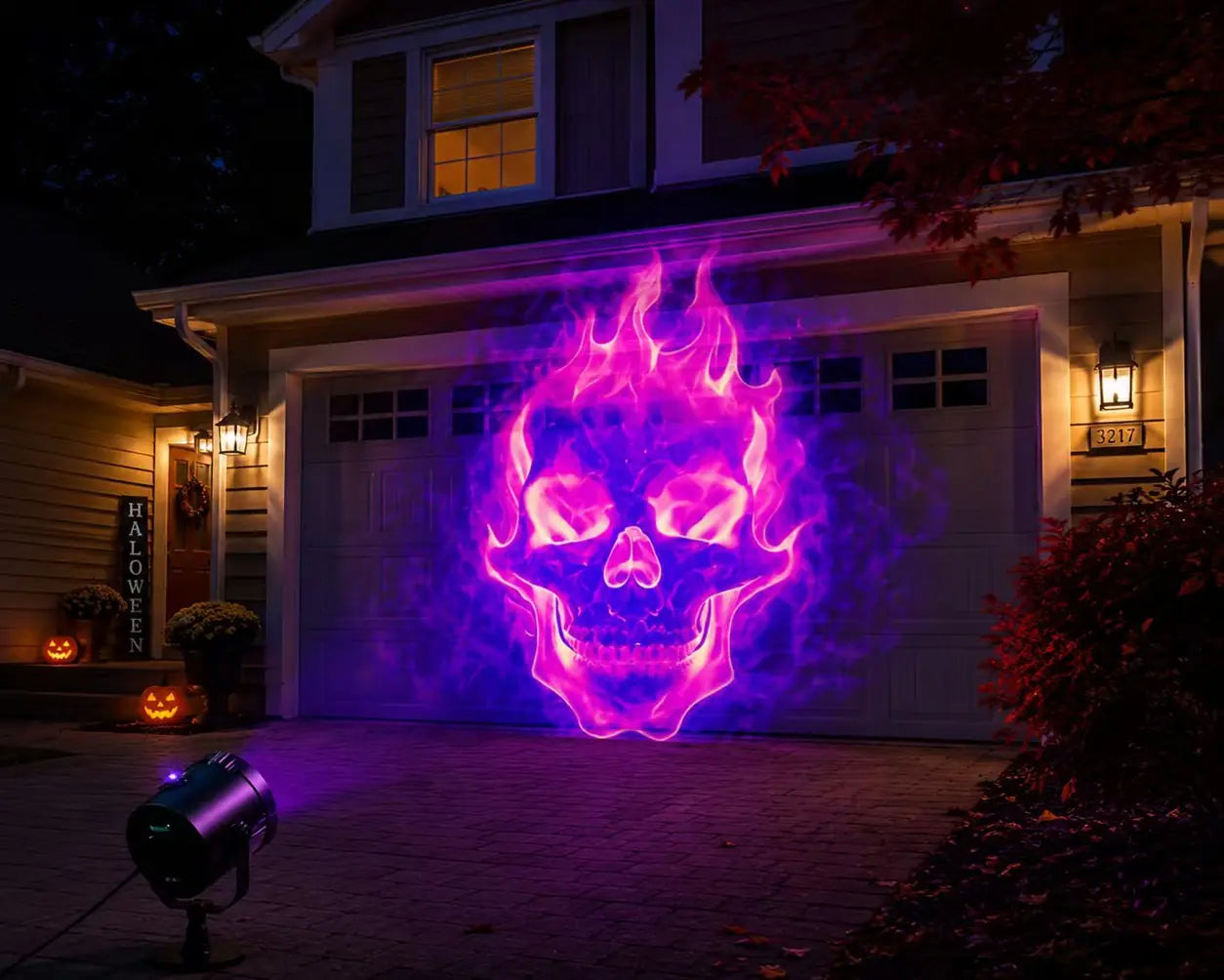 Purple flaming skull projected on a garage door