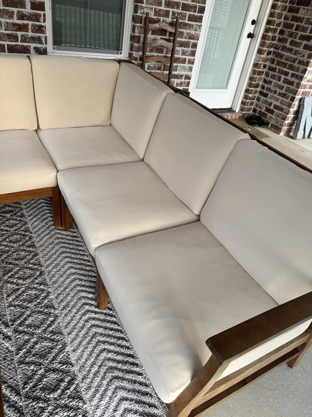 Neutral cushion seating arranged in a comfortable real home setting